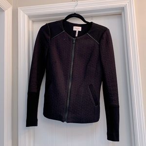 Black zip up Blazer. Size 2. Slim fit. Gorgeous details.